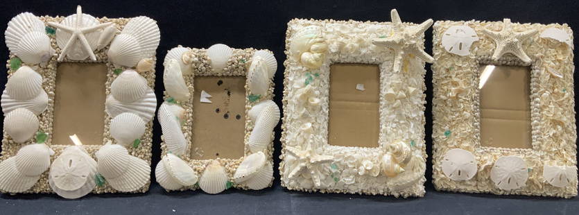 4 Sea Shell & Sea Glass Picture Frames: Lot of 4 assorted sea shell crafted picture frames with clusters of smaller shells and larger white polished clam and muscle shells. Ranging in sizes from 11 x 9, 9.5 x 7 and 11 x 9. With windows meas