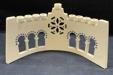 Signed Ceramic Menorah, Judaica: Signed ceramic menorah with architectural motif. Signed with stamp in the corner. Measures approx. 11.75 x 4 x 6.5 inches. Some surface wear including scratching observed. Menorah, ceramic menorah, Ha