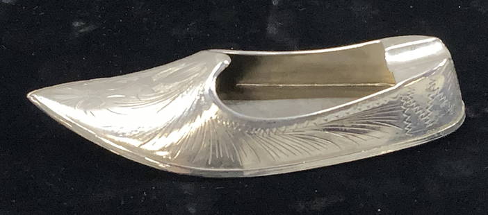 Sterling Silver Etched Shoe Cigarette Ashtray: Hand crafted moccasin shoe ashtray in sterling silver with Victorian etched pattern. Up cycle as a trinket dish. Measures 4 x 1.75 in. .78 ozt. Sterling silver ashtray, sterling silver trinket dish, s