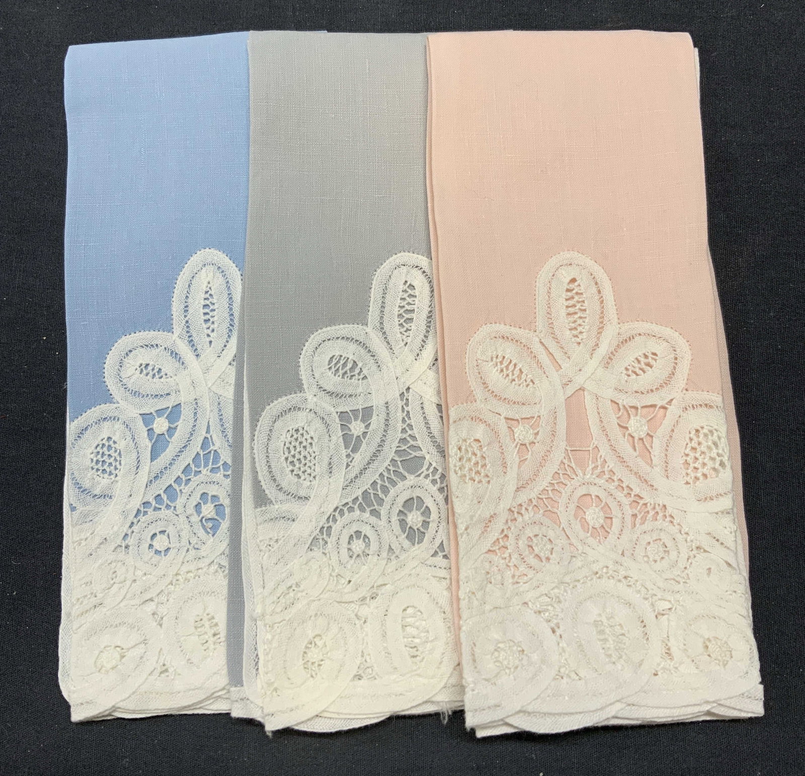 Set 3 Pink/Blue/Gray Cotton Lace Napkins: Set of 3 pieces. Pink+ blue, and gray toned cotton napkins with lace trim. Measure approx. 18 x 10 inches. All pieces have some wear too material consistent with exposure. Napkin, cotton napkin, cockt