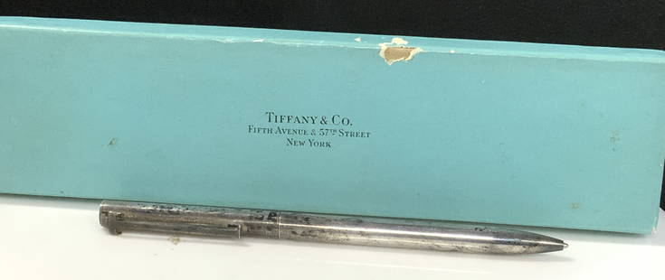 Tiffany & Co Signed Sterling Silver Pen w Box: Tiffany and Co Sterling silver pen with Tiffany box. Signed Tiffany & Co Sterling 925. 5 in long. .72 ozt total weight. Need polishing. Tiffany and Co. sterling silver pen, Tiffany & Co signed ball po