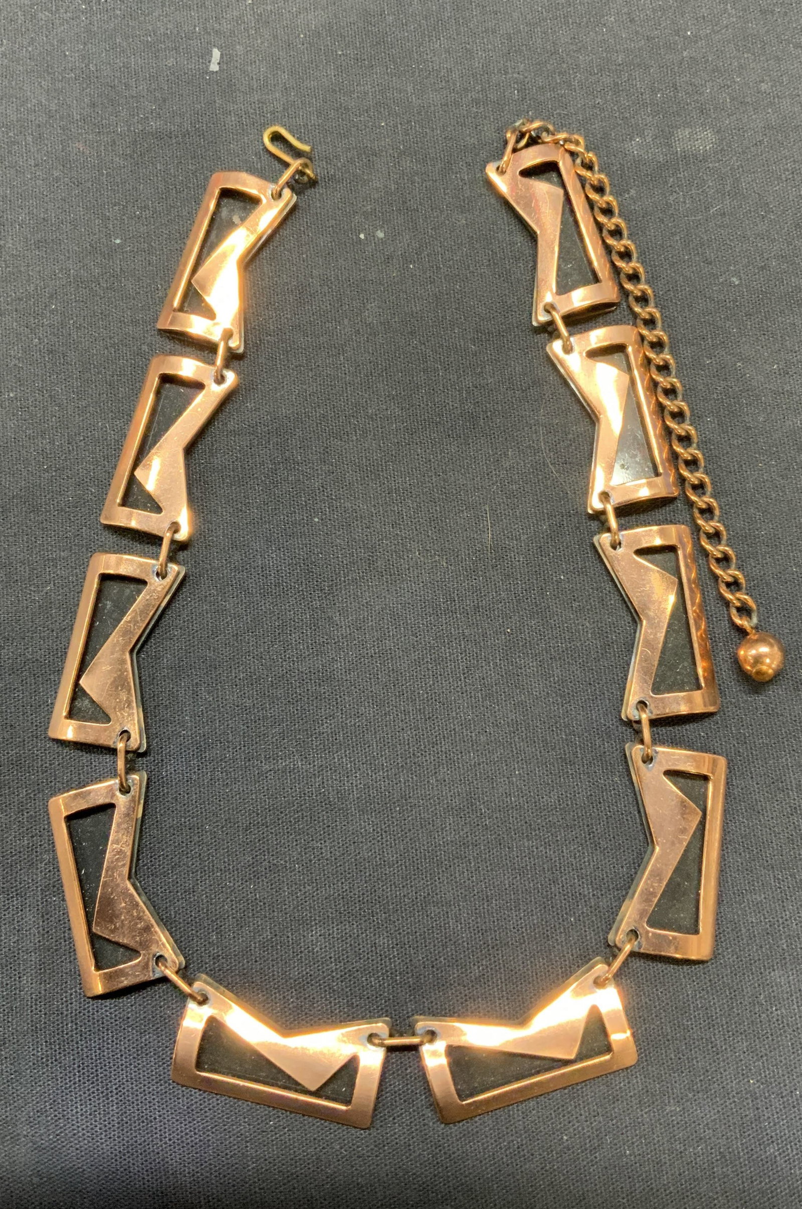 Vintage Copper Geometric Necklace: Vintage copper necklace with geometric panels. Drop length approx. 8.25 inches. Some surface wear including scratching observed. Estate jewelry, costume jewelry, fashion jewelry, cocktail jewelry, acc