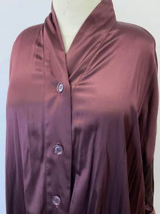 Romeo Gigli Silk Plus Size Blouse, Italy: Eggplant toned silk button down blouse, 28 in. Long. Waist / hips 62 in. . Label reads size 42 Italian size.. Has pockets. Sleeves have a very long sash that wraps around sleeve and buttons in place.