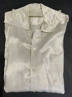 Luxe COMME DES GARCONS Plus Size Blouse Italy: Luxury designer brand COMME des Garcons button down blouse., plus size 50 in. Waist, 30 in. Long. A very light cream with black flecks .made in Italy, attached designer label. A silky polyester. Prope