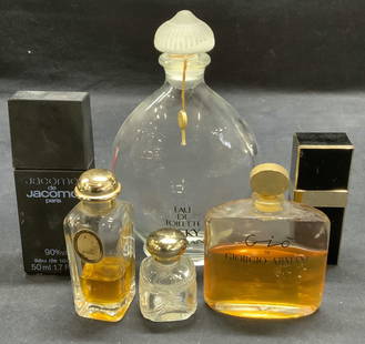 Lot 6 Vintage Perfume Bottles, Hermes, More: Lot of 6 vintage perfume bottles. Designer include Hermes, Chanel, Jacomo de Jacomo, Guerlain, Giorgio Armani, and Avon. All pieces used, as is. Largest bottle measures approx. 4 x 1.75 x 6.75 inches.