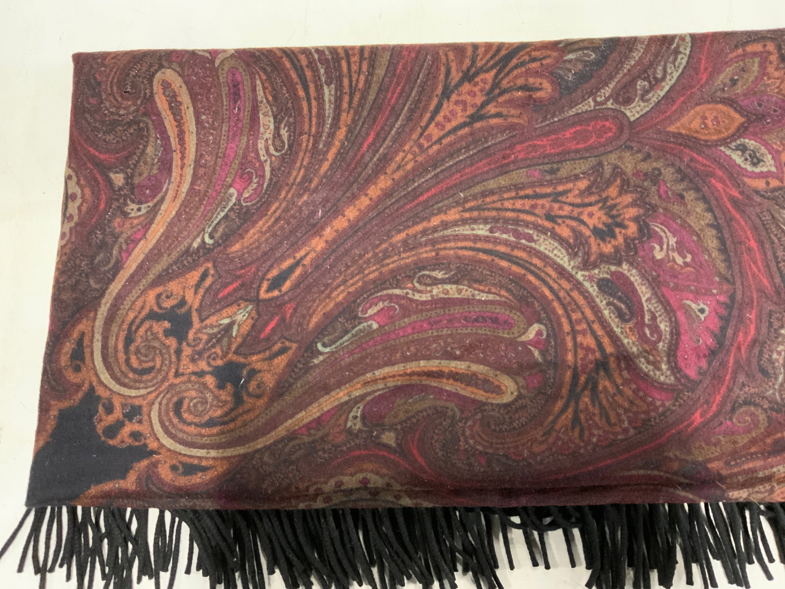HANAE MORI Paris Paisley Cashmere Blanket, Italy: HANAE MORI Paris paisley print cashmere blanket in purple and black with fringe trim. 100% cashmere. Made in Italy. Measures approx. 55 x 58 inches. Some wear to material including blemishes and holes