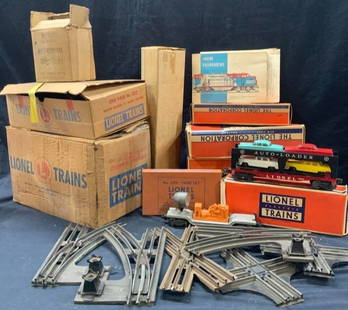 Large Group Lot Lionel Trains & Tracks: Large group lot of over 100 pieces. Lionel trains with tracks. Comes with transmissions set up and 5 train cars. Trains and tracks all possibly Lionel, possibly other brands.Not all box contents exami