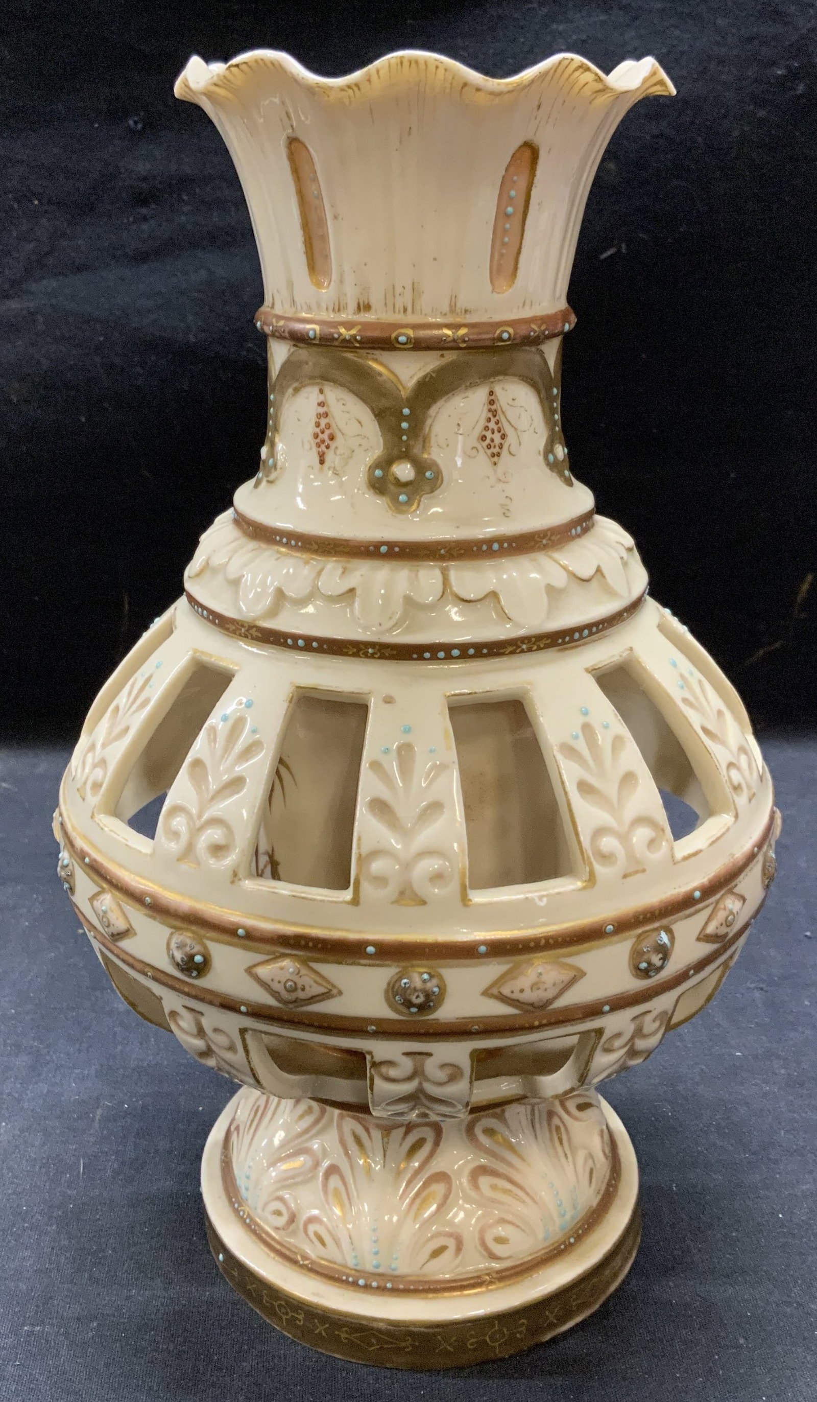 Vintage RUDOLSTADT RW Gilt Porcelain Vase: Vintage, possibly antique, RUDOLSTADT RW gilt porcelain vase. Pierced body with embossed pattern and hand painted detail. Trademarked to underside. Measures approx. 5.75 inches x 10.5 inches. Some sur
