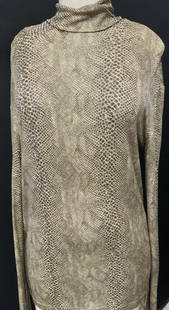 Gianni Versace Versus Snake Print Turtleneck, ITALY: VERSUS BY GIANNI VERSACE brown and beige snake print turtleneck shirt, size 38. Acetate and spandex. Made in Italy. Accented with silver glitter all over. Shirt has weight to it. Shoulders are a stret