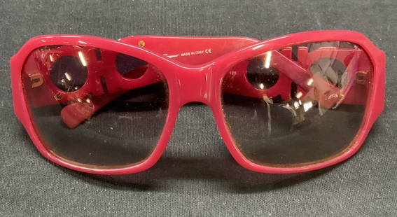 Salvatore FERRAGAMO Pink Sunglasses, Italy: Salvatore FERRAGAMO pink acrylic frame sunglasses. Signed in arm. Made in Italy. Measures approx. 5.5 inches wide, 5 inches long. Some wear to material consistent with Exposure. FERRAGAMO, Salvatore F