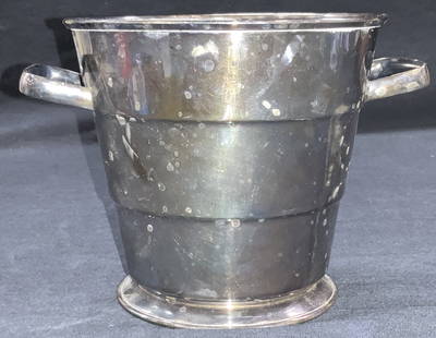 Vintage Silver Plate Bucket, England: Vintage silver plate ice bucket / vessel Marked silver plate, made in England. Side handles and tiered exterior. Approx 5 inches tall and 6 inch diameter. Evident discoloration to surface. Vintage buc