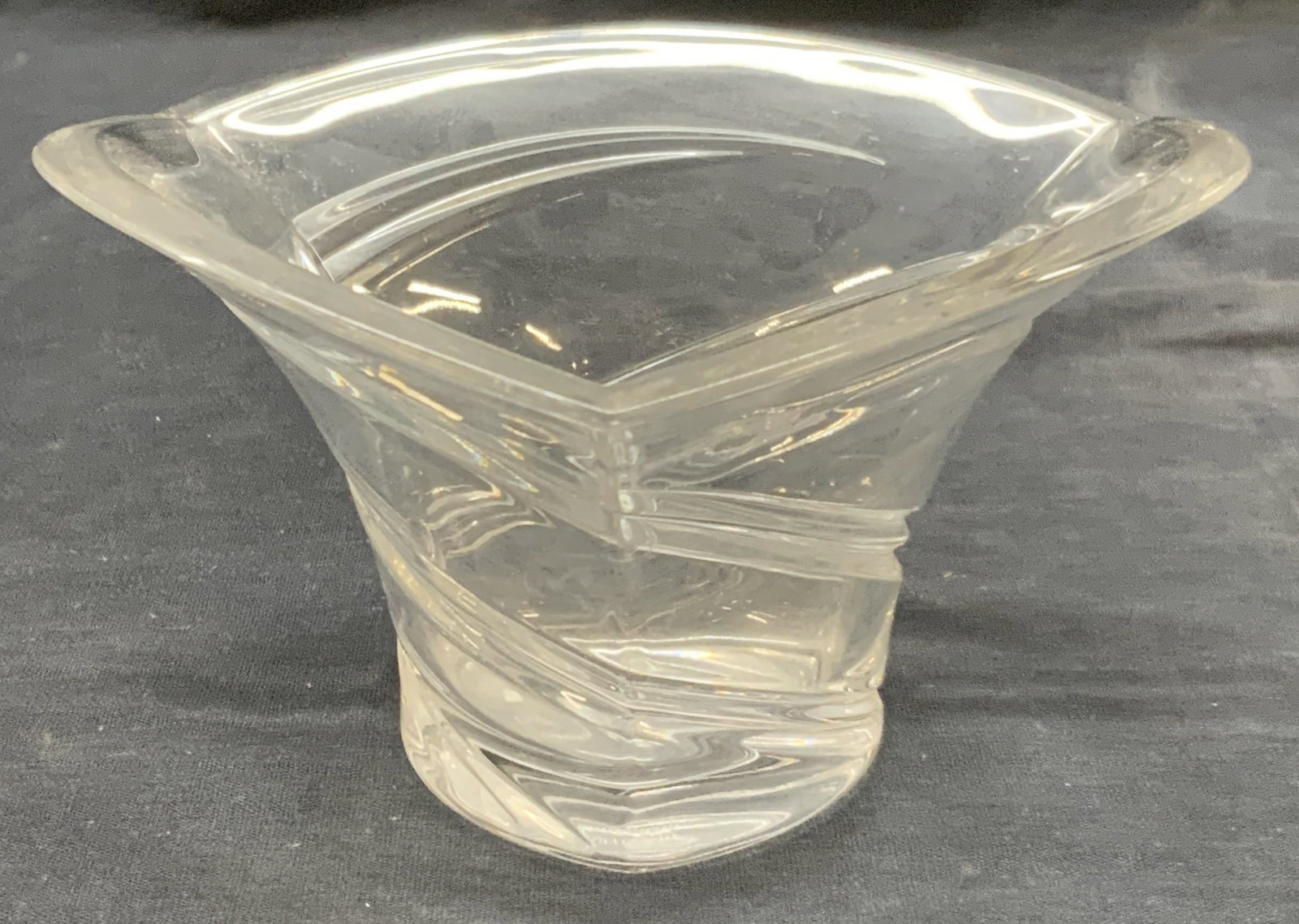 Marquis By Waterford Cut Crystal Vase: Marked Marquis by Waterford. Cut crystal vase with flared rim and spiral cut grooves on exterior, approximately 3 inches tall and 6 inch diameter. Moderate surface wearing due to age and use. Waterfor