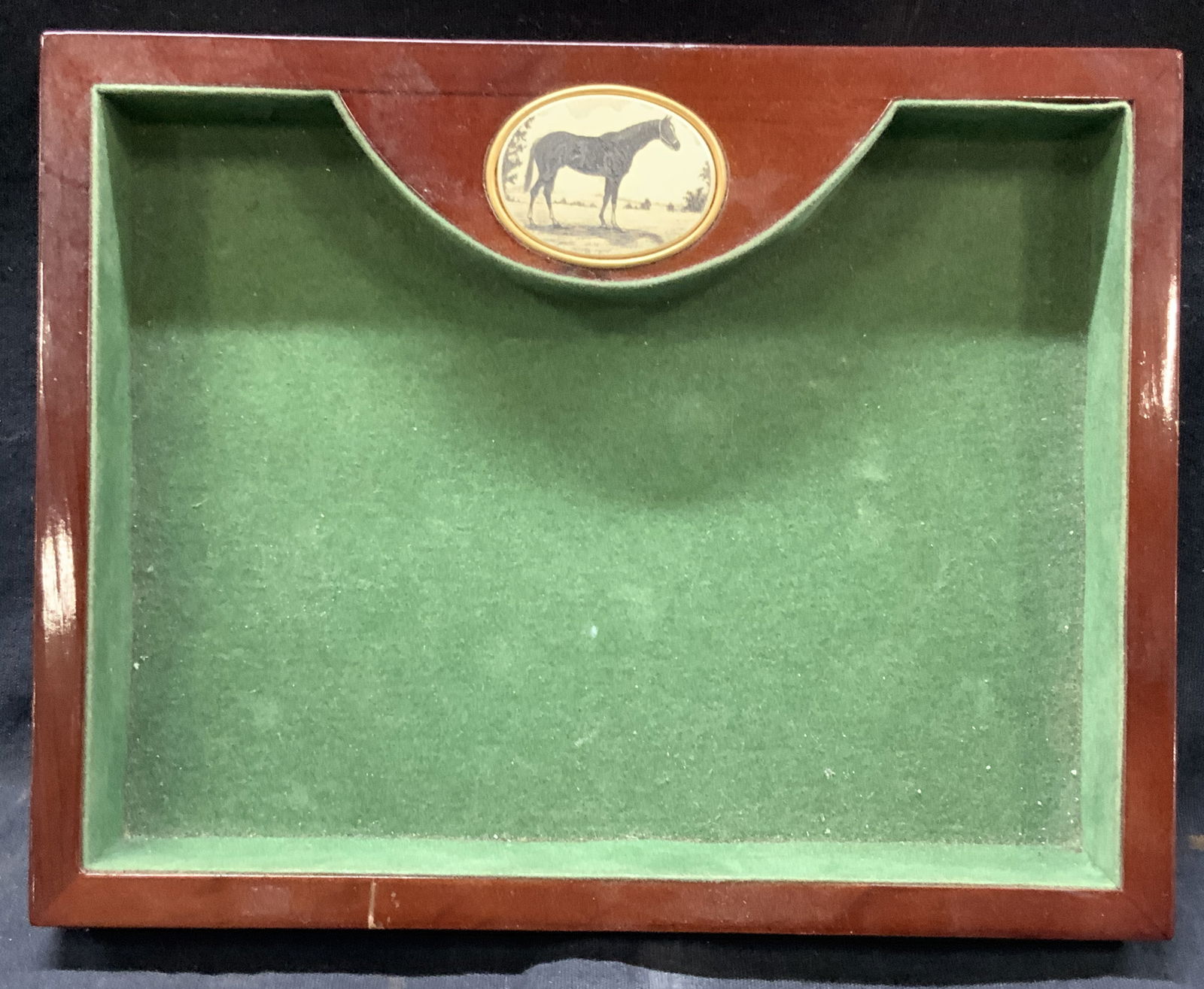 Finished Wood & Scrimshaw Horse Desk Accessory: Vtg finished red toned desk accessory with scrimshaw etching of a horse on the top of the tray and lined with green velvet. Approx 1 inch tall and 8 x 6 inches wide. Minor wearing to edges of wood and