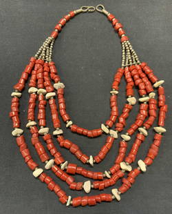 Vintage Coral Multi Strand Necklace: Vintage coral, white stone, and silver tone beaded multi strand necklace. Drop length of shortest strand approx. 8 inches. Some surface wear including scratching observed. Estate jewelry, costume jewe