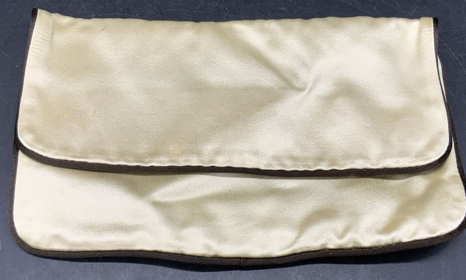 PRADA Style Italian Travel Case / Cosmetics Bag: A soft hand satin style travel case / cosmetics bag featuring a PRADA MILANO DAL 1913 plaque to the obverse. Interior plaque reads PRADA MADE IN ITALY. Brown and cream hues to the piece. Measures appr