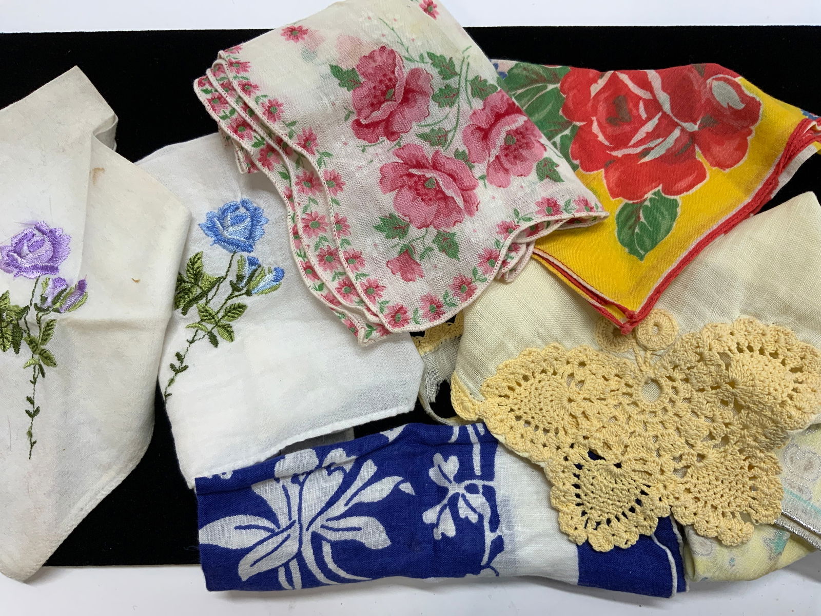 Lot 7 Vintage Cotton Hankies: Vintage cotton hankies, a couple with embroidery. Linen, cotton, and crochet. Some wear to all, either a tear or discoloration. Up cycle. Yellow and coral rose print. Blue and white tropical flower pr