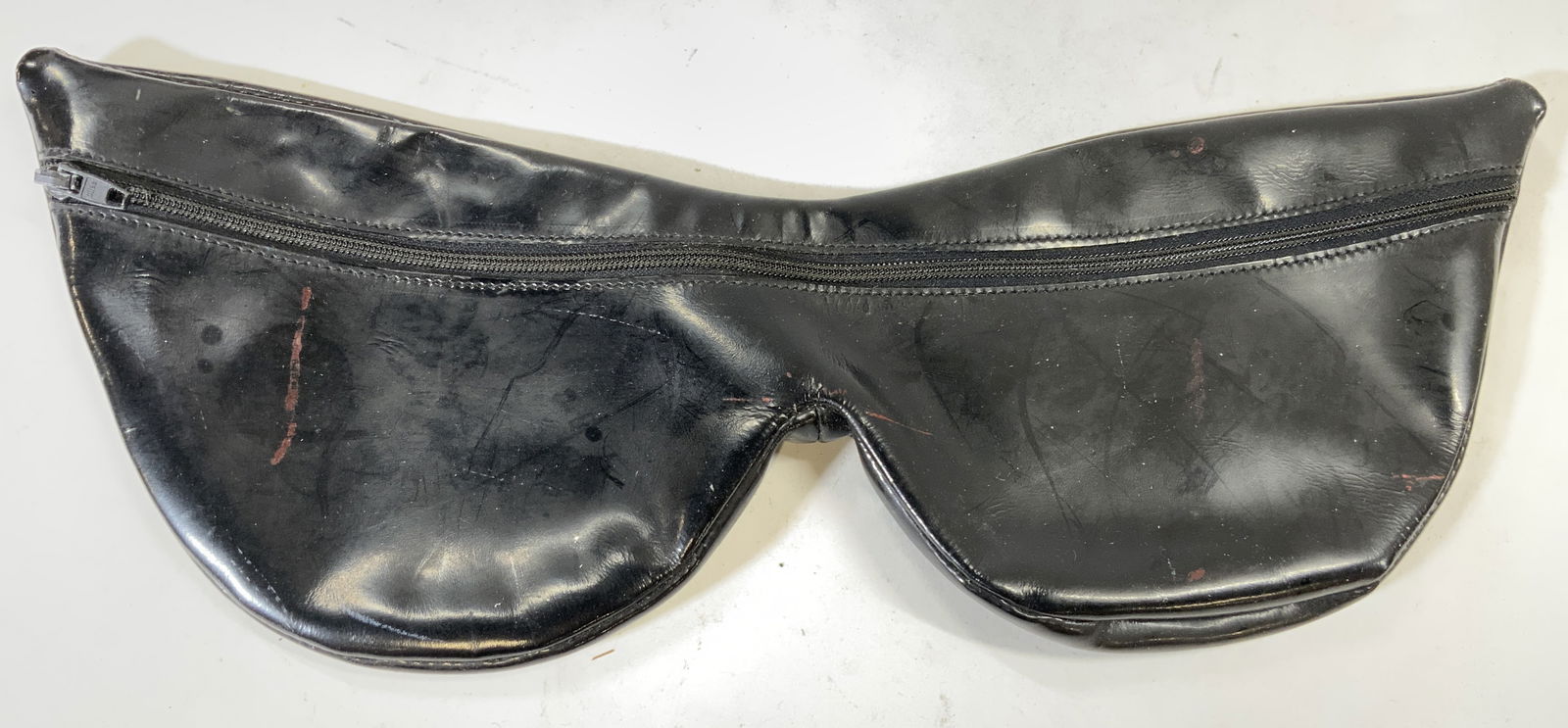 JEAN LOUISEMBERT FRANCE Patent Leather Purse: Interior reads JEAN LOUISEMBERT FRANCE. purse, clutch bag, evening bag is in the shape of a pair of sunglasses. Piece is black toned patent leather. purse has one zipper pocket area. Piece measures ap
