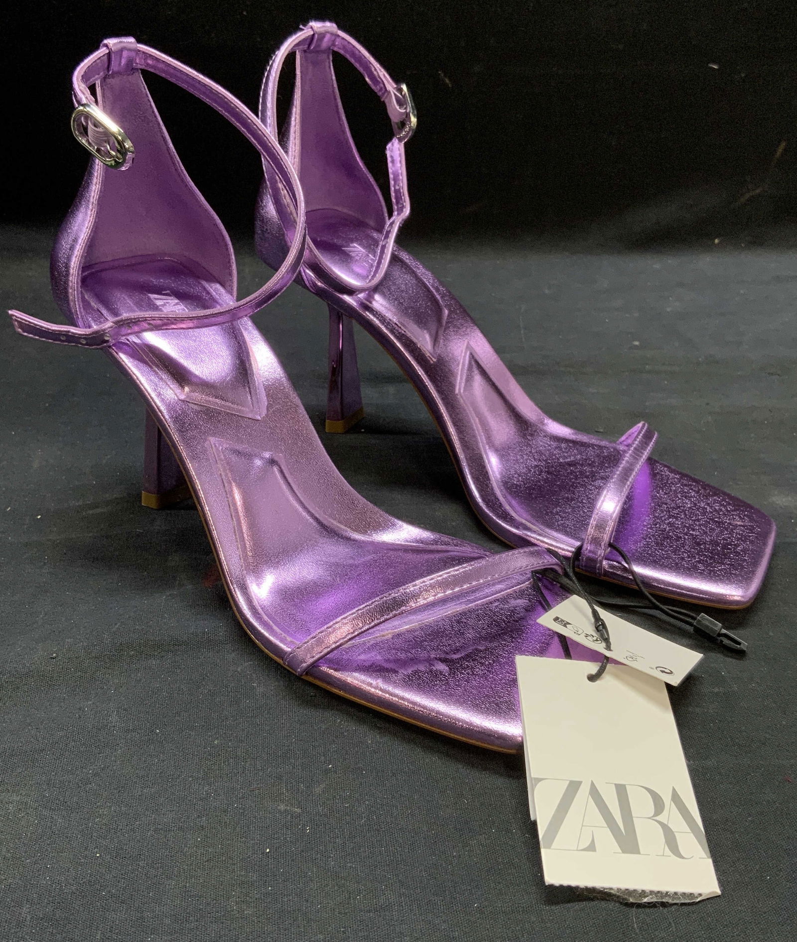 Zara Purple Metallic Heels New with Tag: Zara purple metallic strappy heels. Size 39/8. New with tag. Synthetic material. Zara, Zara heels, Zara shoes, ladies designer heels, ladies designer shoes, ladies designer fashion ladies purple heels