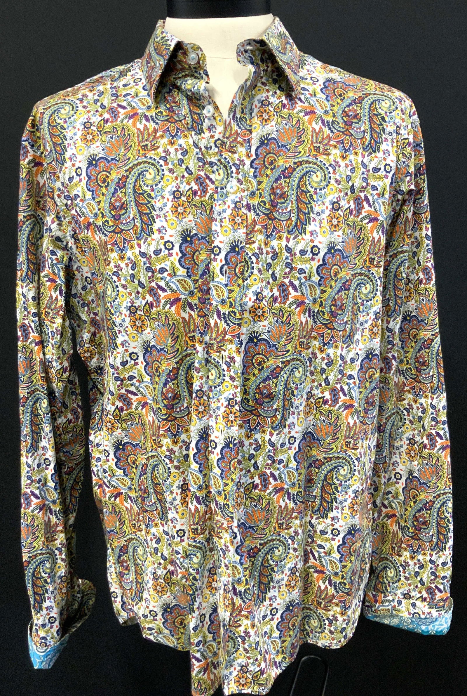 David Smith Cotton Paisley Patterned Button Up: David smith 2xl, cotton button up. Marked no artificial colors. Adorned in paisley patterns with vibrant colors. Sleeves measure 21 inches from underarm inseam torso measures 29 inches and chest measu