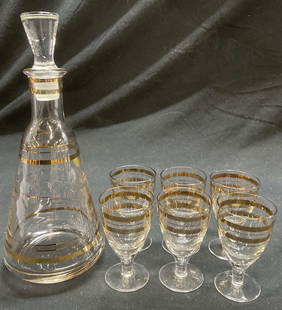 Hand Made Crystal Decanter and 6 Glasses USSR: Vintage luxury Hand Made clear Crystal Decanter with stopper.. Gold Gilt stripe design and crystal stopper. 6 copita / sherry Glasses with gold Gilt stripe design. Made in USSR. Decanter measures 9.5