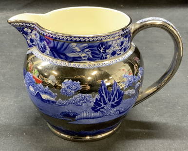 Vtg Wedgwood Fallow Deer Silver Lustre Pitcher England: Vintage Wedgwood and Barlaston of Etruria ceramic pitcher in Fallow Deer pattern. Blue with silver Lustre. Trademarked to underside. Made in England. Measures approx. 6.5 x 4.5 x 4.5 inches. Some surf