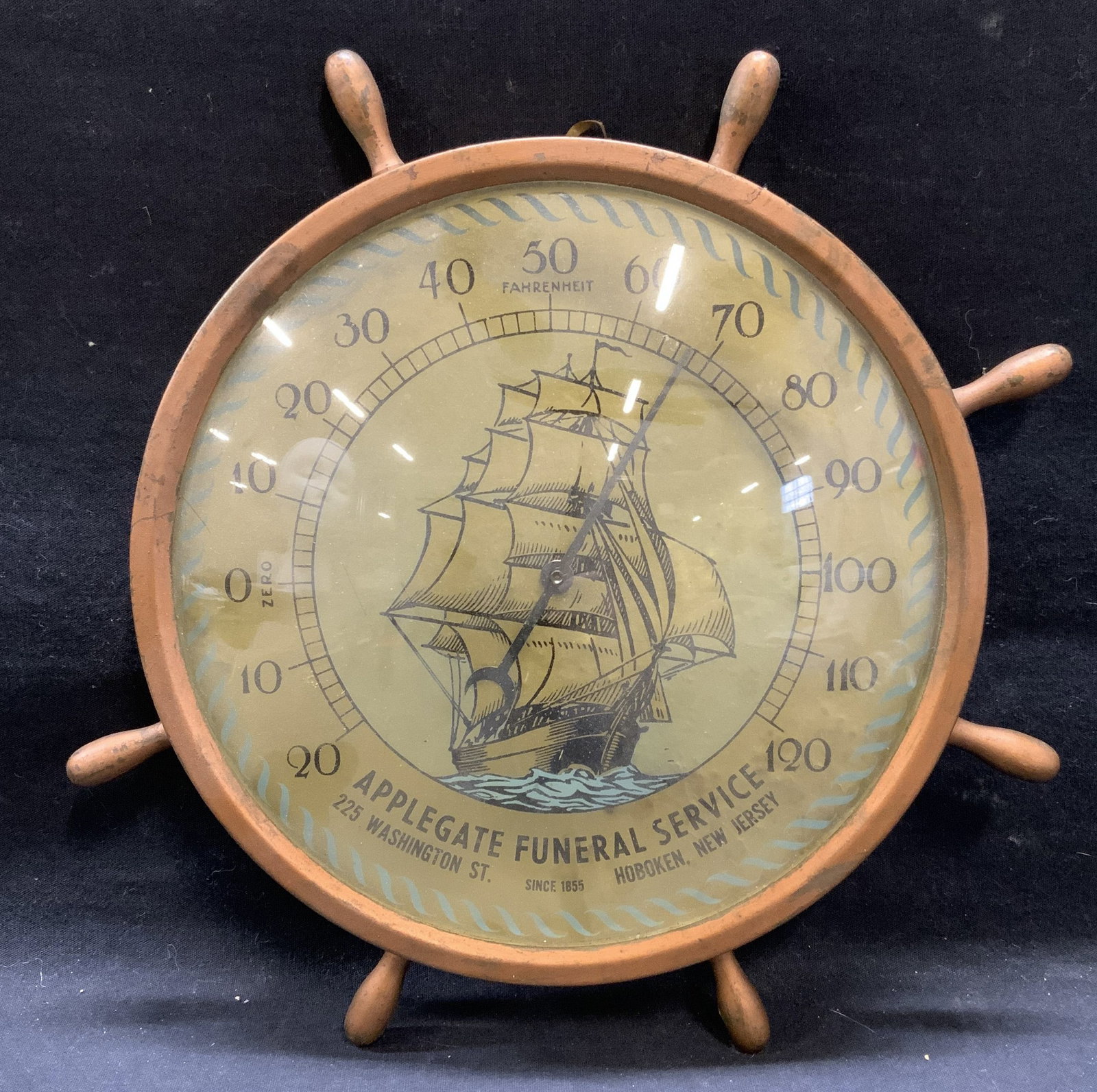 Vtg Funeral Advertising Nautical Thermometer: Vintage Applegate Funeral Service nautical thermometer. Ship steering wheel form with ship motif at center. Reads Applegate Funeral Service 225 Washington Street Hoboken, New Jersey Since 1855. Metal,