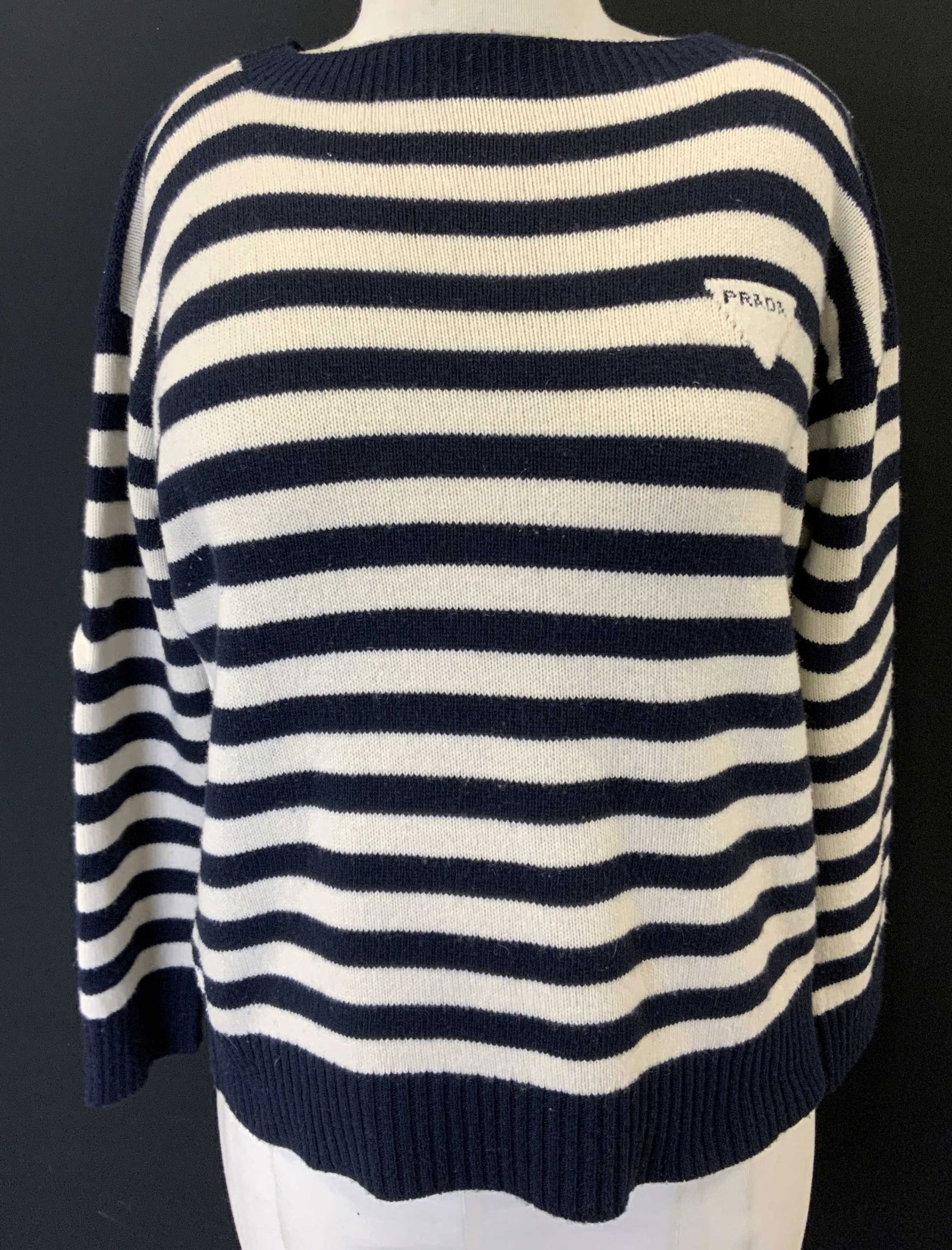 PRADA Cashmere Navy & White Sweater, Italy: Nautical style Prada cashmere sweater, size 38 Size 2 USA. Generous fit, should fit up to size 6. Navy and white directional stripes. Prada logo is on the front side. Long sleeves. Original Prada numb