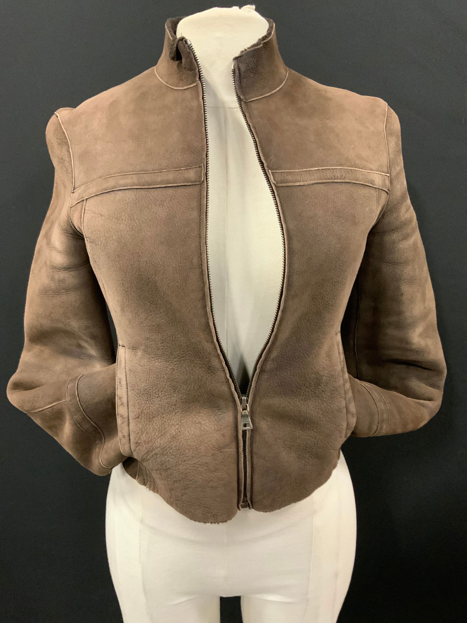 Jil Sander Shearling Lined Leather Jacket , Italy: Size XS ( Italian size 34) Jil sander brown shearling and leather jacket. Made in Italy., 18.5 in. Long. 28 in. Waist. Labels read 100% genuine leather, lining 100% cotton. Jil Sander Jacket, Leather