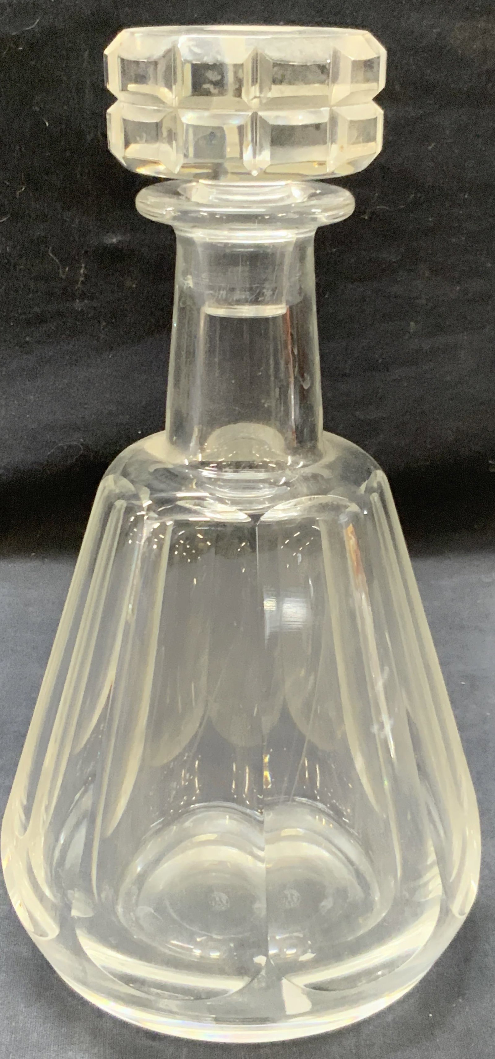 Baccarat Thick Walled Crystal Decanter, France: Marked Baccarat France on underside. Thick walled Crystal decanter with diagonal cut panels on sides and geometric cut stopper. Approx 9 inches tall and 5 inch diameter. Moderate surface wearing Bacca