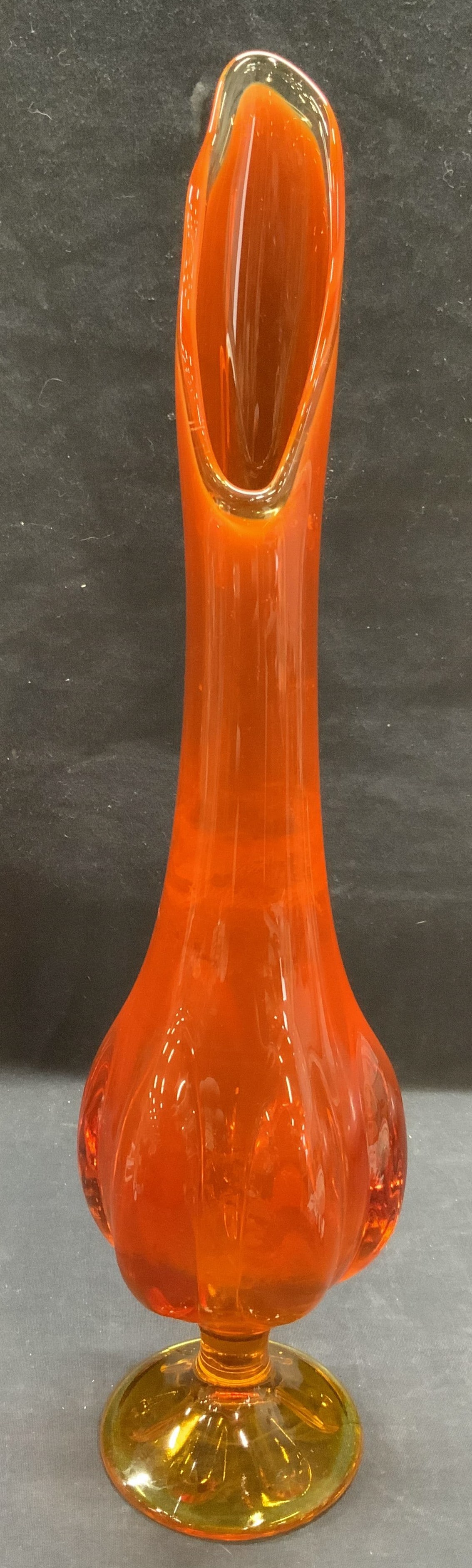 Mid Century Modern Orange Swung Glass Vase 19.5in: Vintage mid century modern orange swung glass vase. Raised surface detail and drip rim. Measures approx. 4.5 x 19.25 inches. Some surface wear including scratching observed. Swung glass, swung glass v