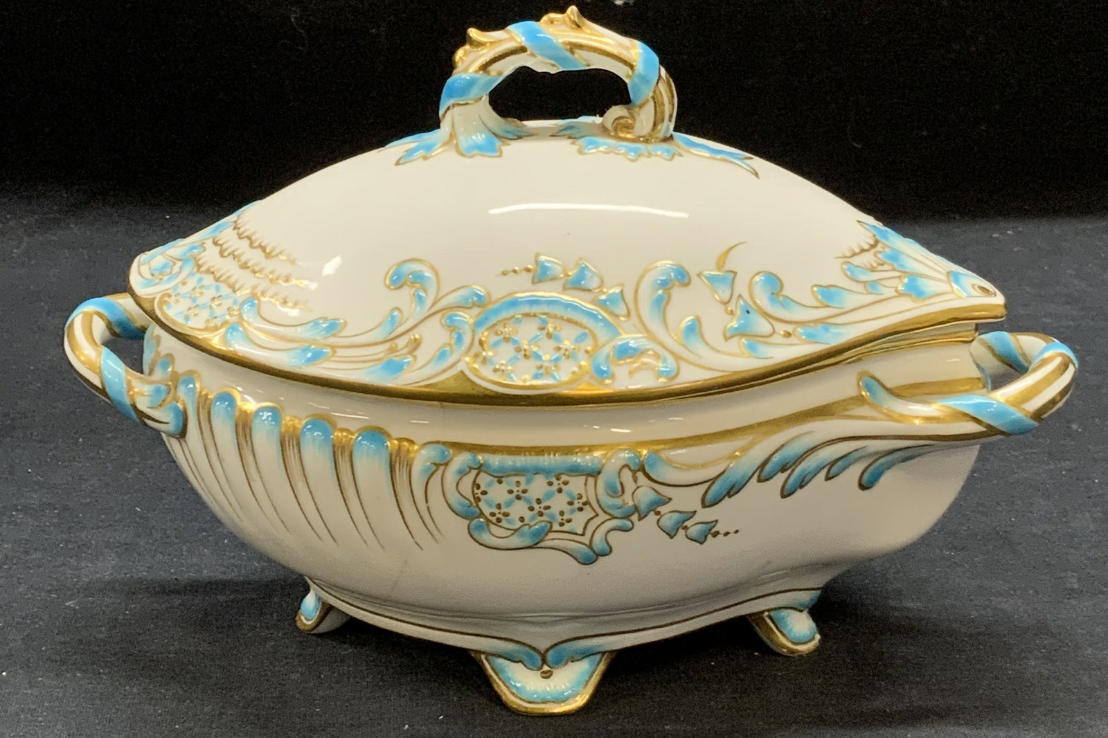 Antique MINTONS Lidded Gilt Porcelain Bowl: Antique MINTONS Davis & Collamore lidded porcelain bow. White with hand painted blue and gilt scroll decoration. Trademarked to underside. Measures approx. 8 x 3 inches excluding lid. Bowl has been pr