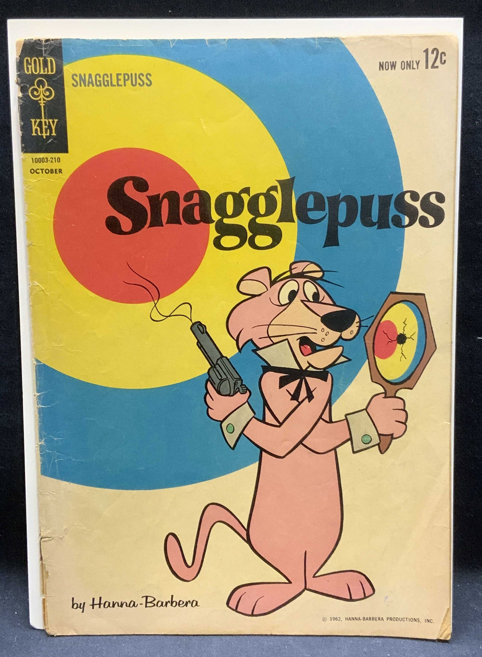Gold Key Hanna Barbera Snagglepuss #1 1962: Gold Key Comics Snagglepuss by Hanna Barbera issue number 1. First issue. Illustrated in color. Published by Gold Key, 1962. Measures approx. 10.25 x 7 inches. Wear to cover, pages, and binding consis