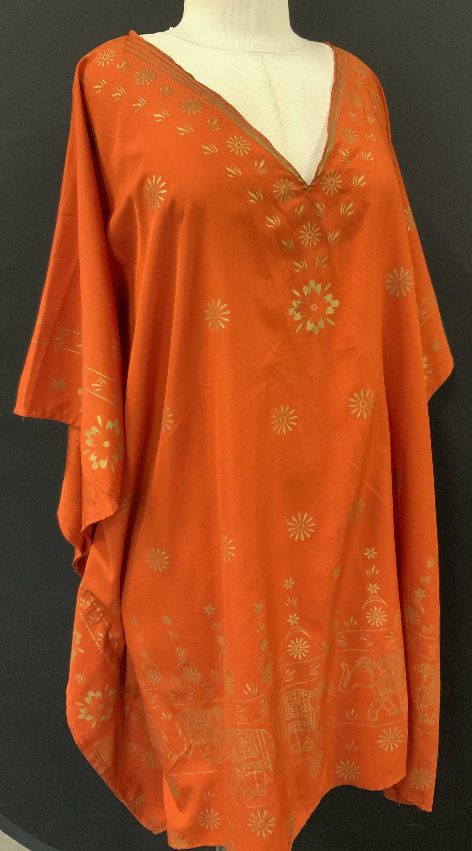 Hand Stenciled Orange Kaftan w Asian Elephants: Ladies muumuu / caftan in orange with stenciled East Asian pattern of florals and ceremonial Asian elephants in gold paint. 32 in. Long, 56 in. Waist. Supposed to hang loose. Feels like a rayon fabric
