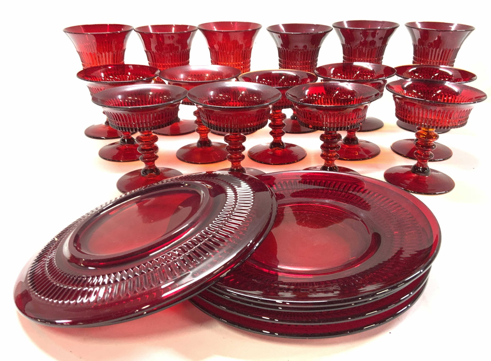Vntg FENTON Ruby Red Lincoln Glass Tableware Set 21: FENTON Lincoln Inn pattern Ruby Red Glassware. Consists of 6 plates ( 8 in.), set 6 wine glasses ( 5.75 x 3.75 in.) , and set 9 compote/ coupes/ cocktail stemware glasses ( 4 x 4 in.). scratching on p