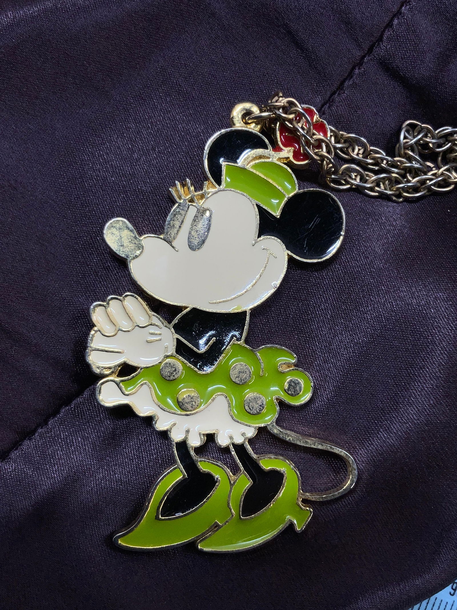 Walt Disney Enamel Minnie Mouse Pendant on Chain: Enamel and gold tone Minnie Mouse Pendant / Accessory, 3 x 2 in. Hallmarked Walt Disney Productions. comes with a necklace chain, drop is 7 in. Minnie Mouse, Walt Disney Productions official jewelry,