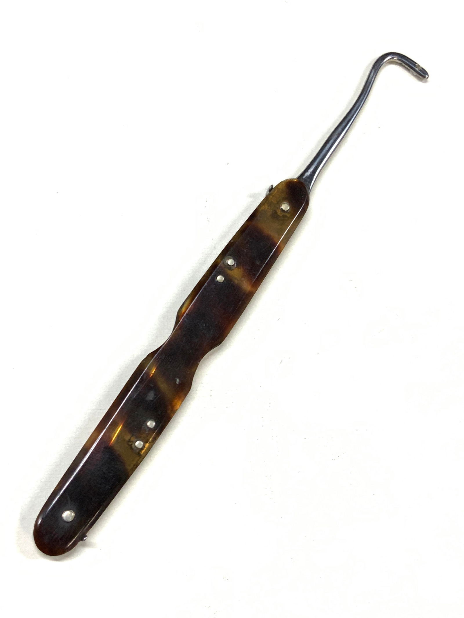 W.L.Lord Vtg Bakelite Handle Crochet Hook: Marked W.L.Lord crochet hook with speckled brown bakelite handle. Approx 5.25 inches long. Moderate wearing to metal hook. Bakelite vintage crochet hook. Crochet hook. Home decor, crochet tools, sewin