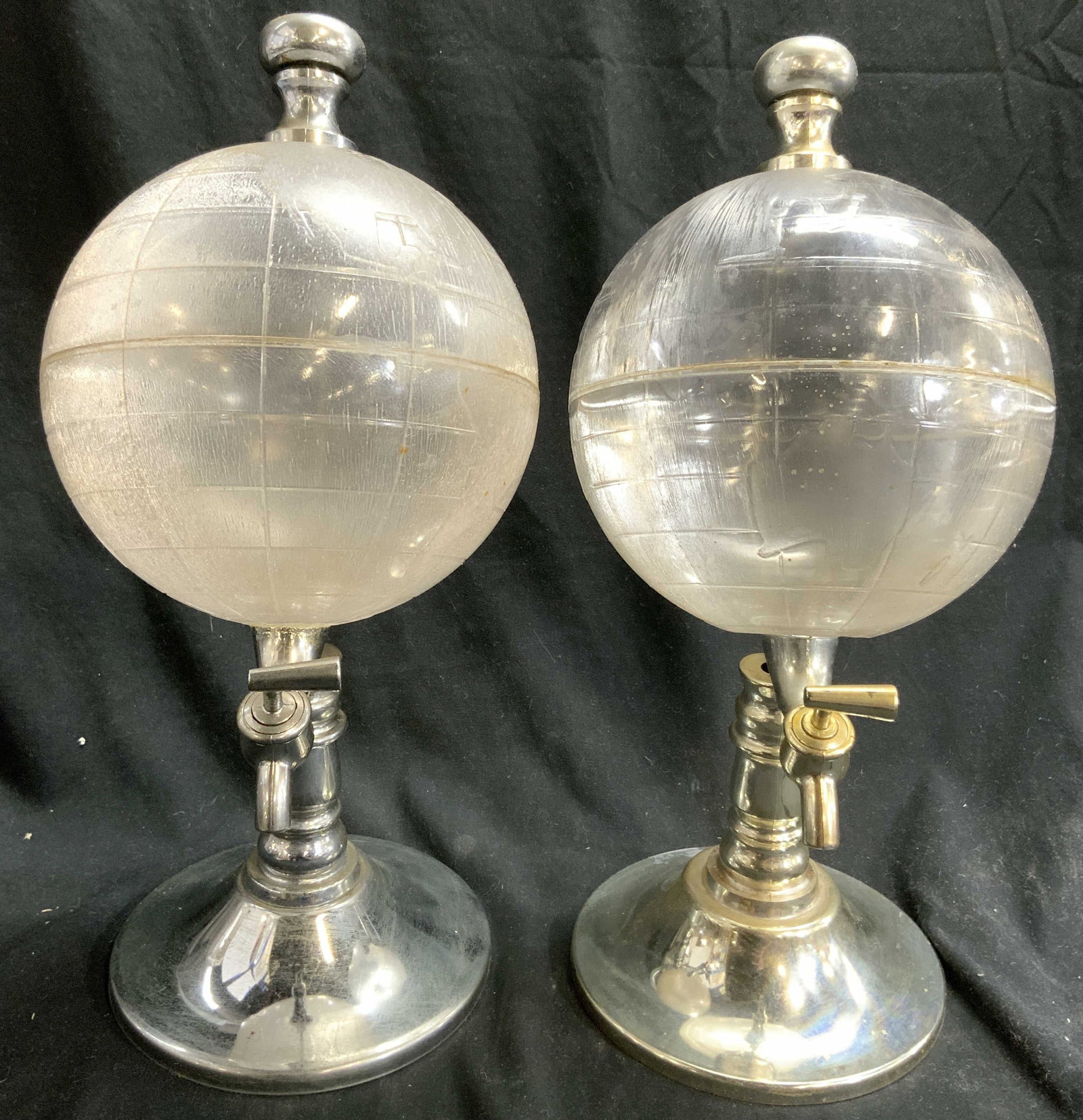 Near Pr GODINGER + Globe Samovars: Lot includes 2 samovars. Near pair. Each have globe shape and detail. 1 marked GODINGER this one has a metal base. Other unmarked. All composite material, both Globes are composite. Each measures appr