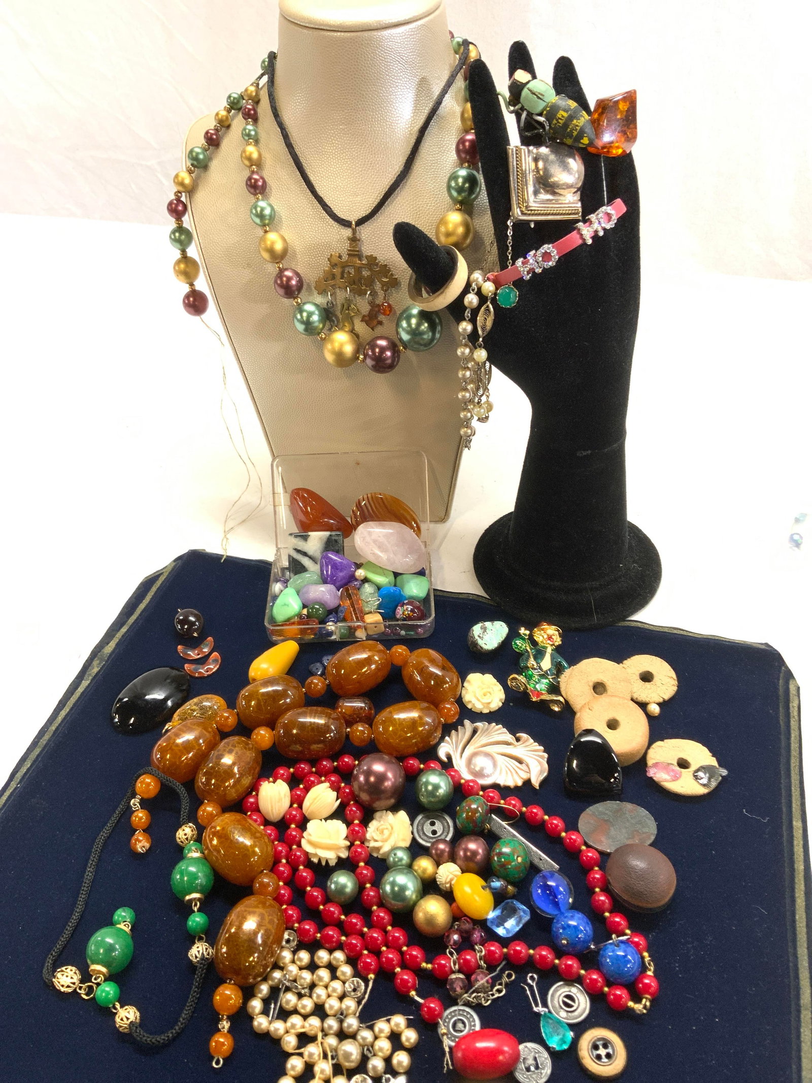 Polished Gemstones, Sterling, Jewelry Makers Lot: Mixture of costume jewelry parts , sterling silver, and polished natural stone cabochons, stones, and beads. Many items can be up cycled and made into new jewelry or used for arts and crafts. There is