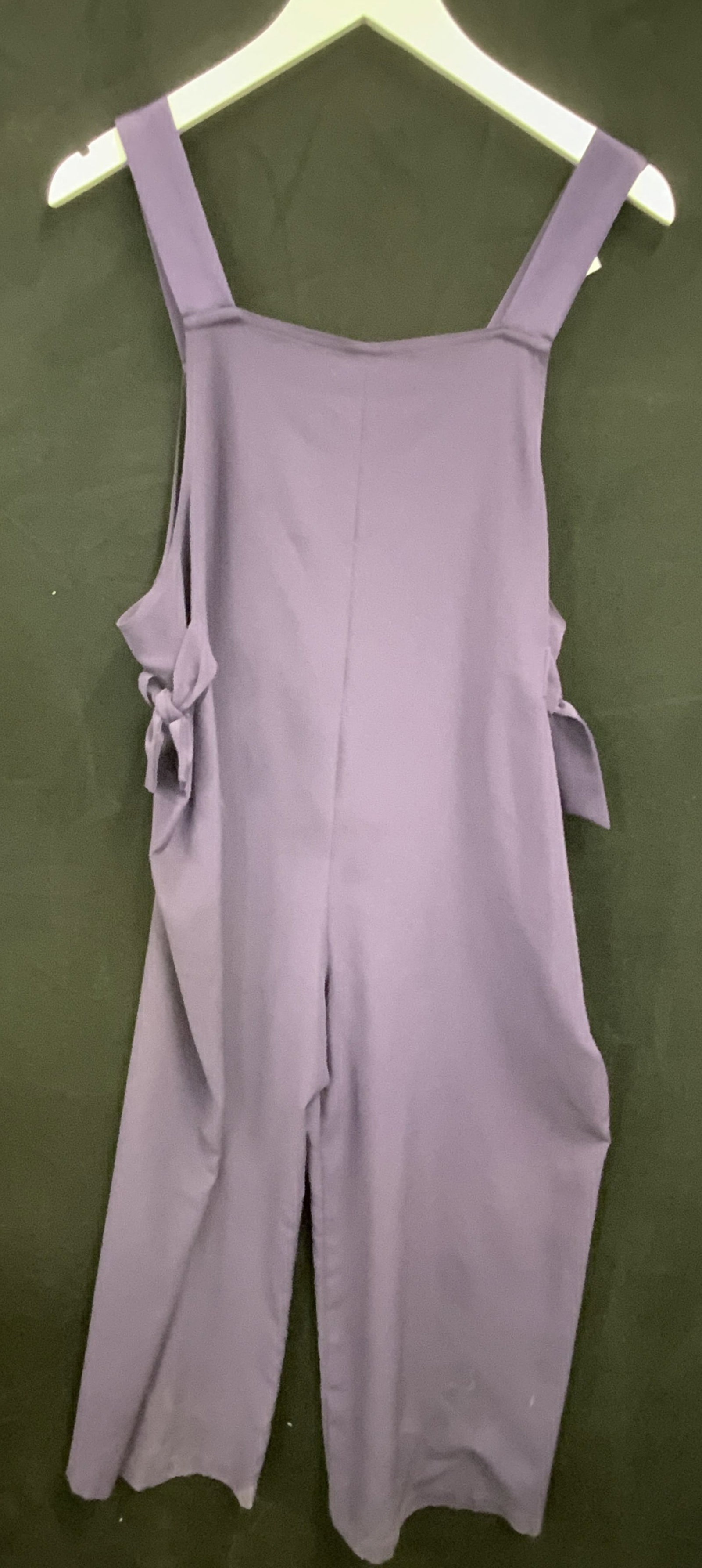 PETROVITCH & ROBINSON PARIS Purple Jumpsuit: A purple jumpsuit with wide tank top straps. Brand tag reads PETROVITCH & ROBINSON PARIS. Size tag reads 36. Material tag reads 100% POLYESTER. Measured flat approx. 54 inches from strap to base. Some