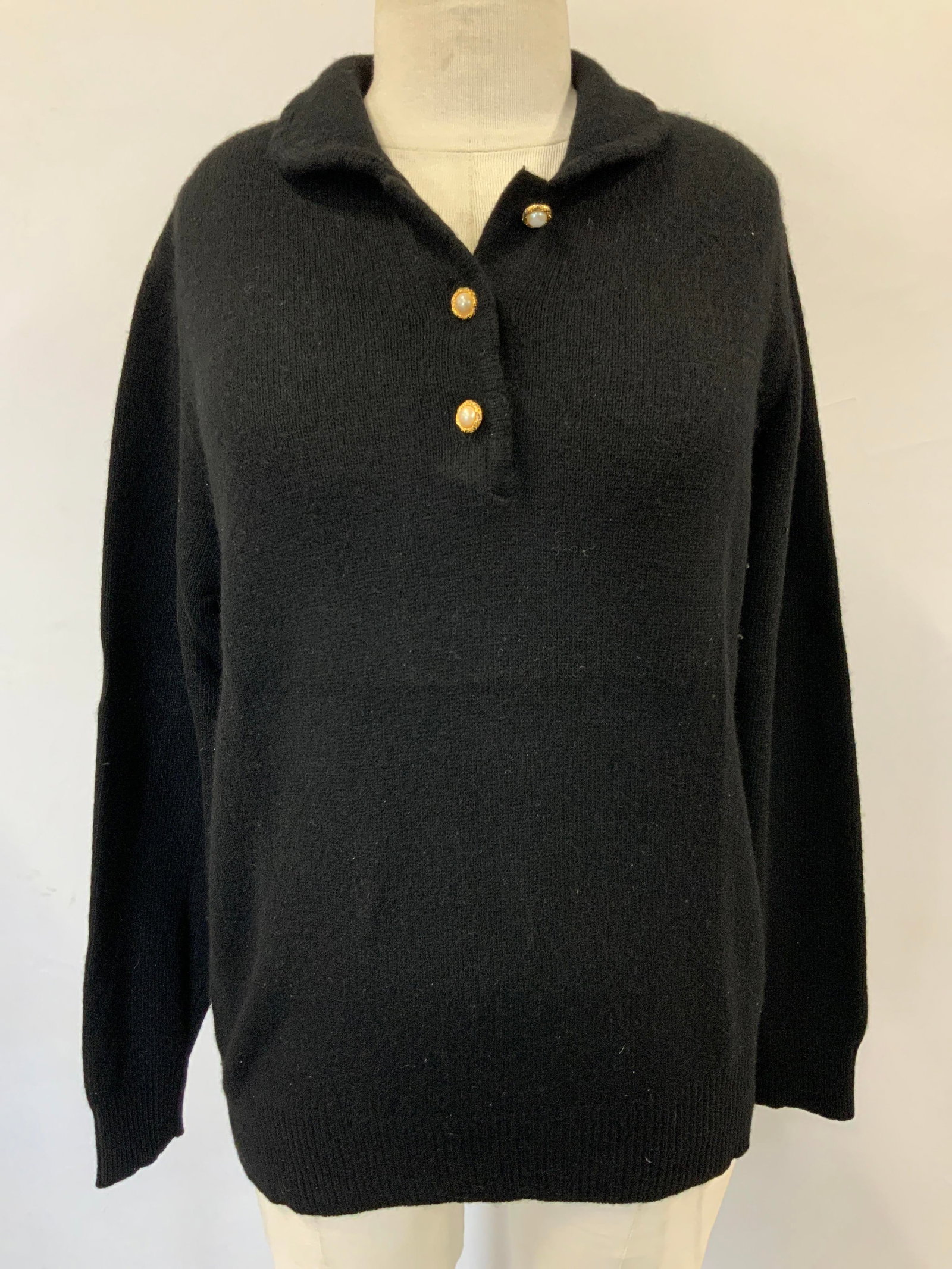 White Wheeler & Martha Cashmere Sweater: White wheeler & Martha black cashmere sweater, size medium with pearlescent and gold toned buttons on collar. Approx 17 inches long sleeves, torso measures 24 inches down and chest measures 20 inches 