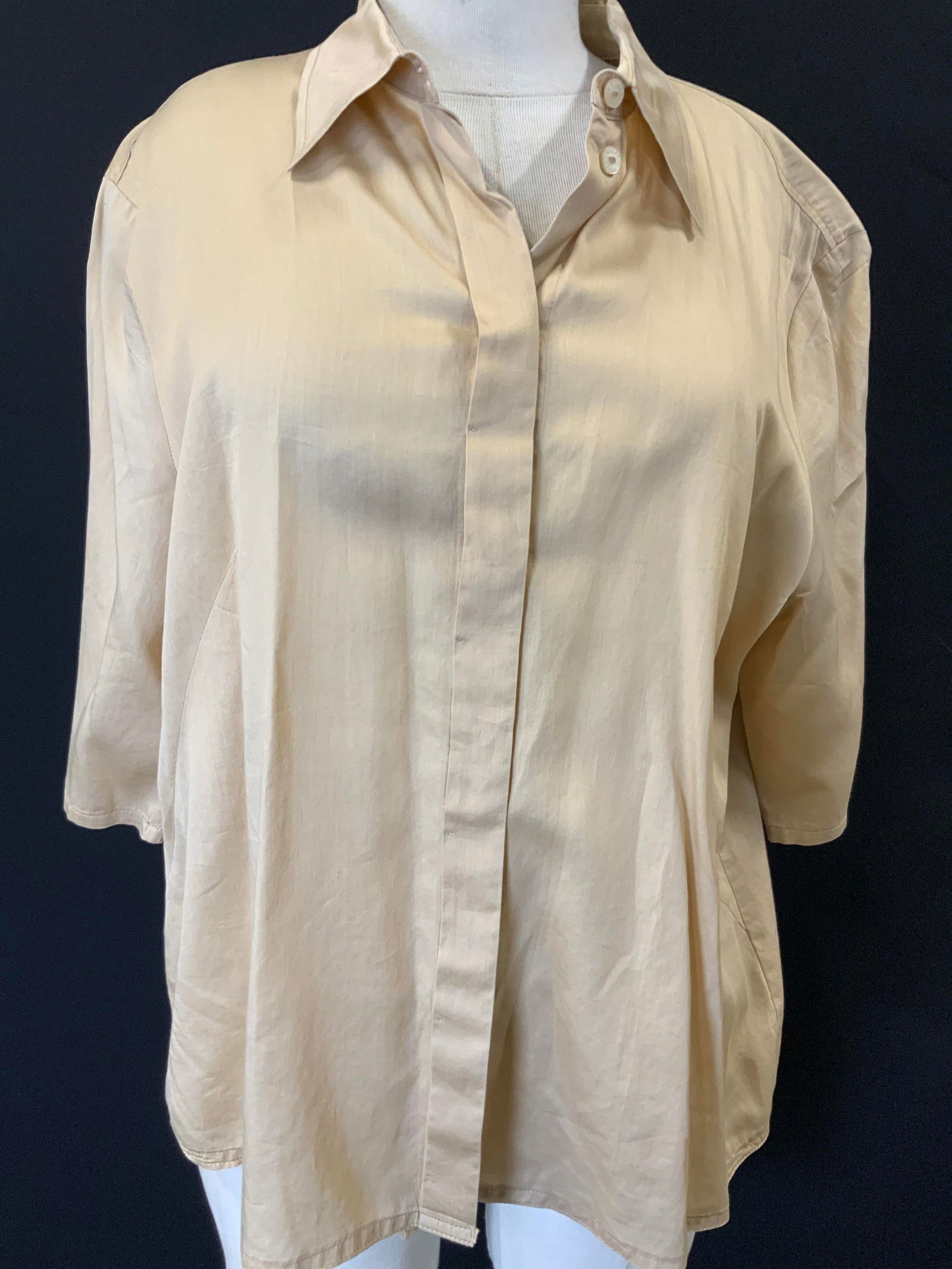 Escada Sport Silk Button Up: Escada sport button up collared shirt, size 44. Sleeves measures 7 inches long, torso measures 24 inches long and chest measures 18 inches across. Moderate wearing to threading throughout. Escada spor