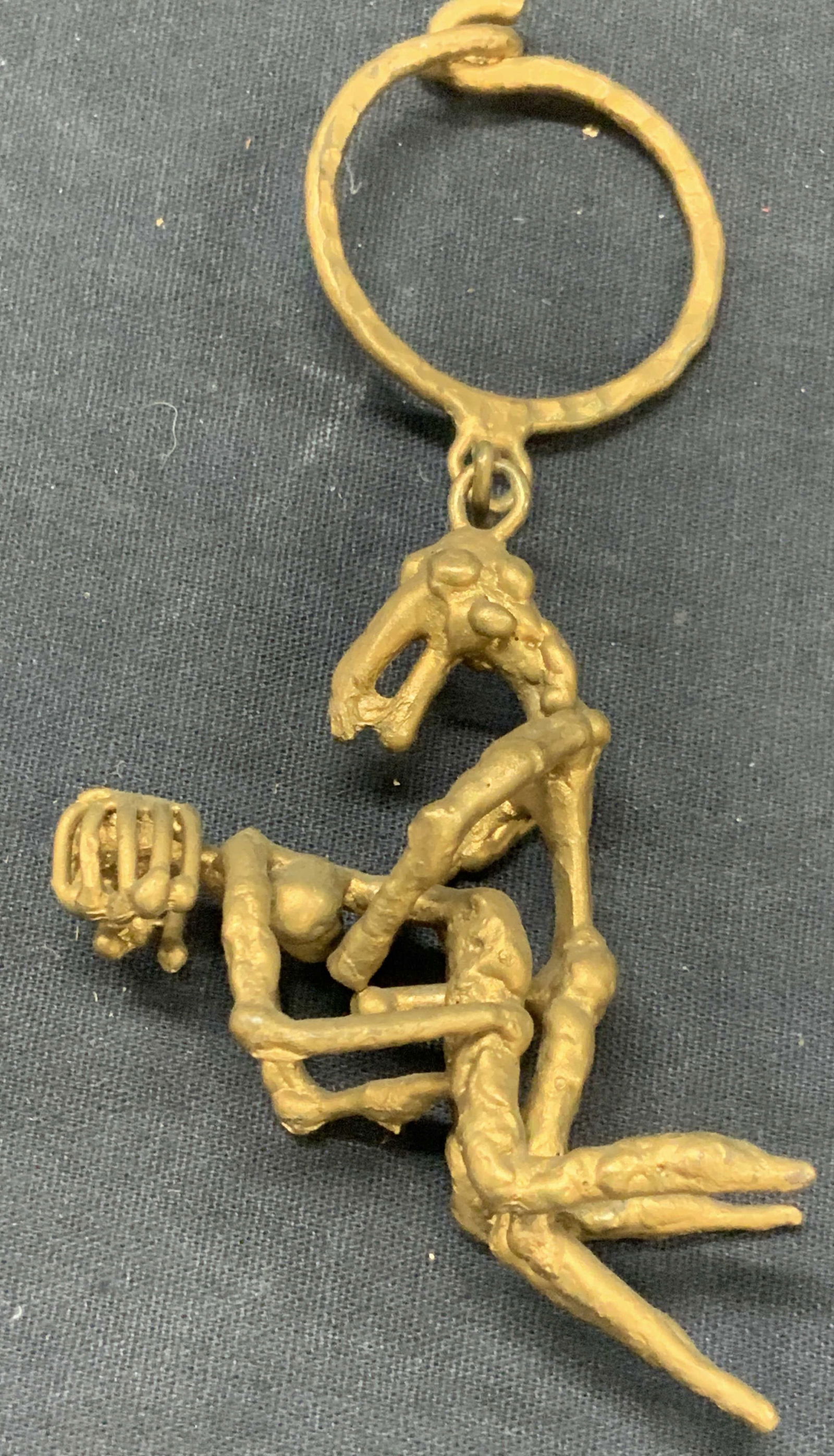 Vintage Hand Crafted Brass Erotica Key Chain: Vintage brass crafted hand made keychain of a couple in an erotic fashion. Approx 5 inches tall and figures being 3 inches wide. Moderate wearing to metal due to age and use Brass keychain, hand craft