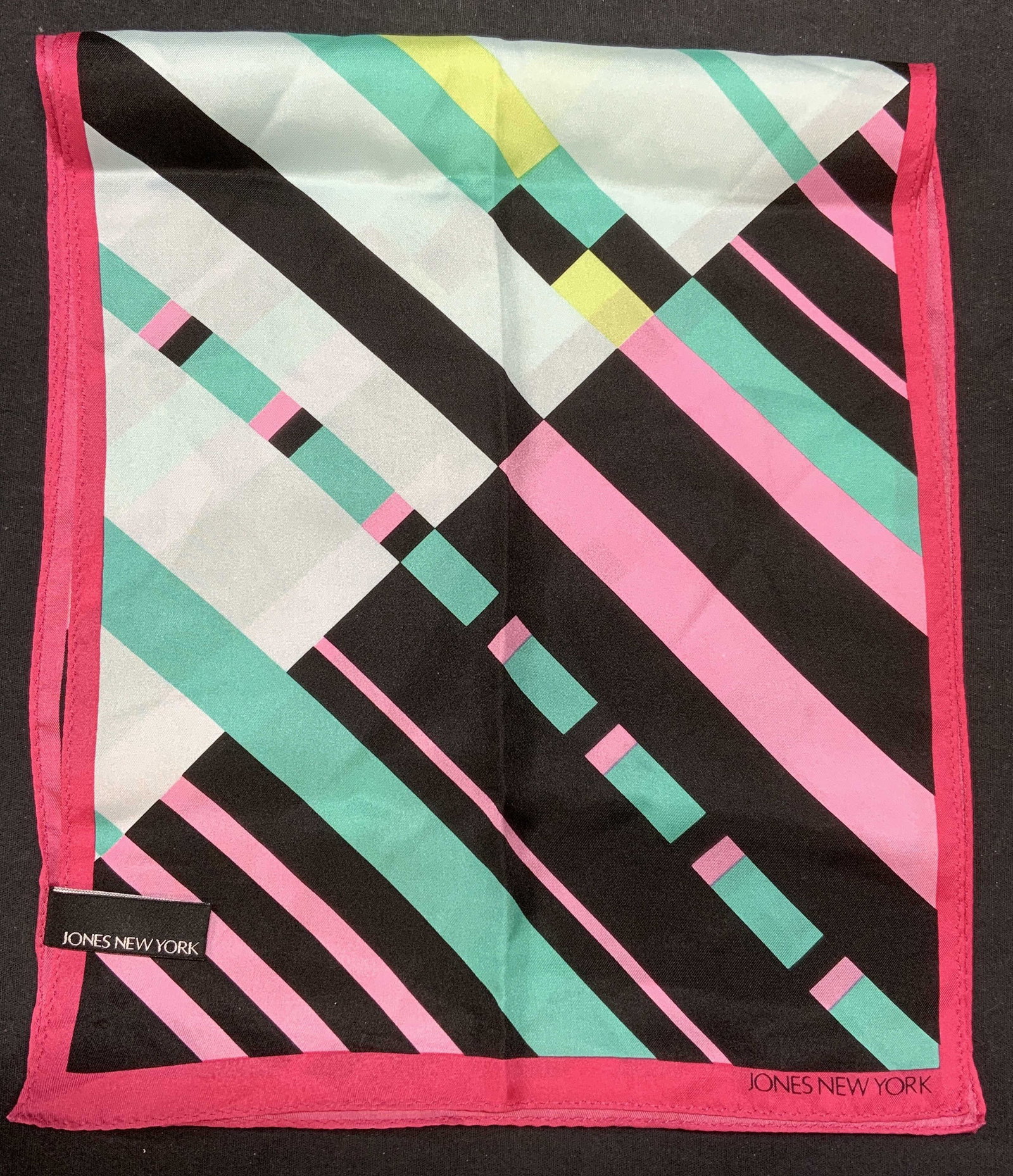 Jones New York Blue Silk Striped Scarf 4.3ft: Jones New York blue multi color striped scarf. 100% silk. Designer label to lower right corner. Measures approx. 52 inches long. Some wear to material consistent with exposure. Jones New York, jones N