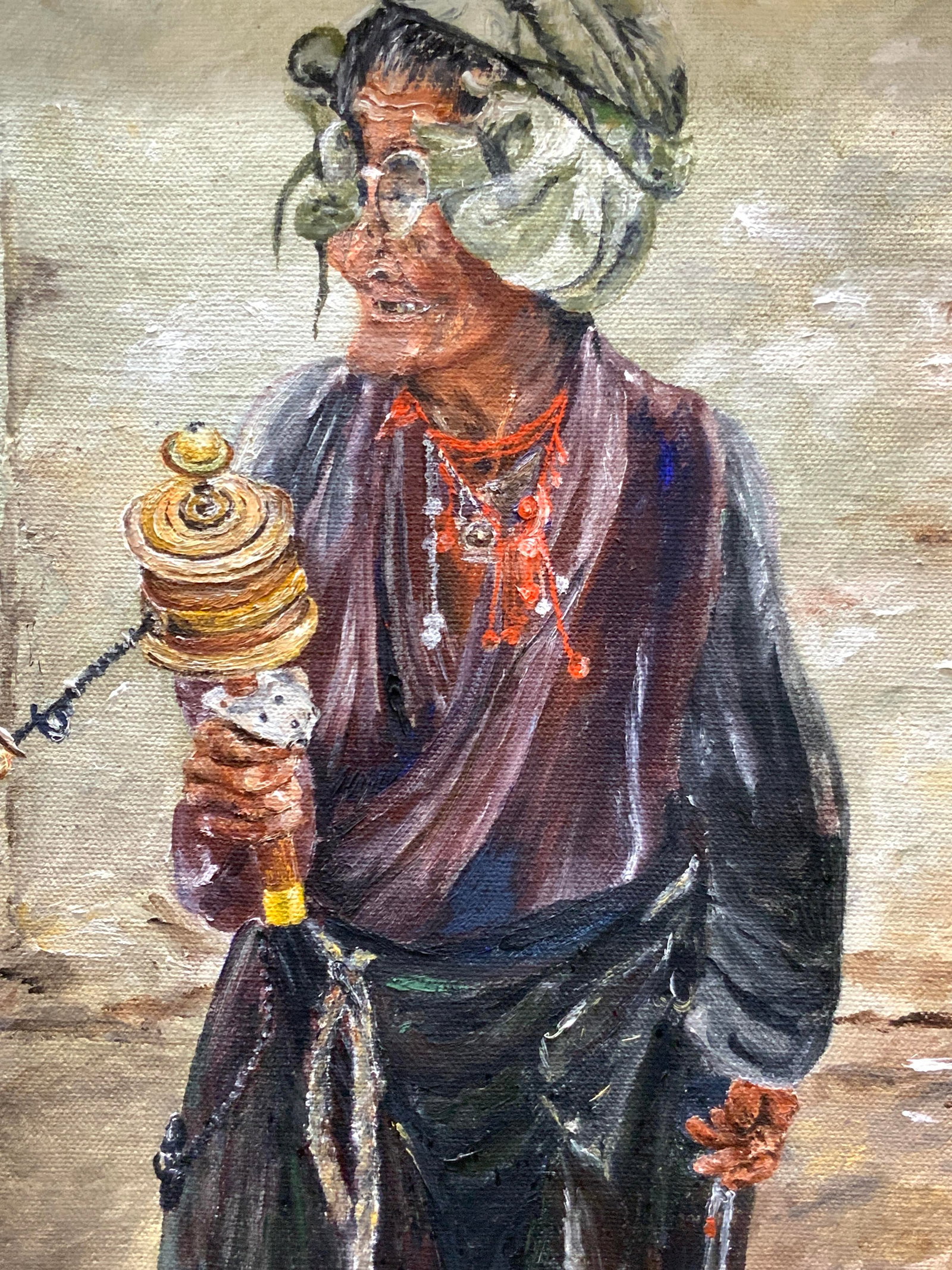 Signed Woman Figural Acrylic Painting, 1984: Signed on lower right corner Else Reuser marked on backside 1984 Depicts an elderly woman holding a Tibetan Buddhism Prayer wheel. Framed in a gold leafed wooden frame made to resemble bamboo. Approx 
