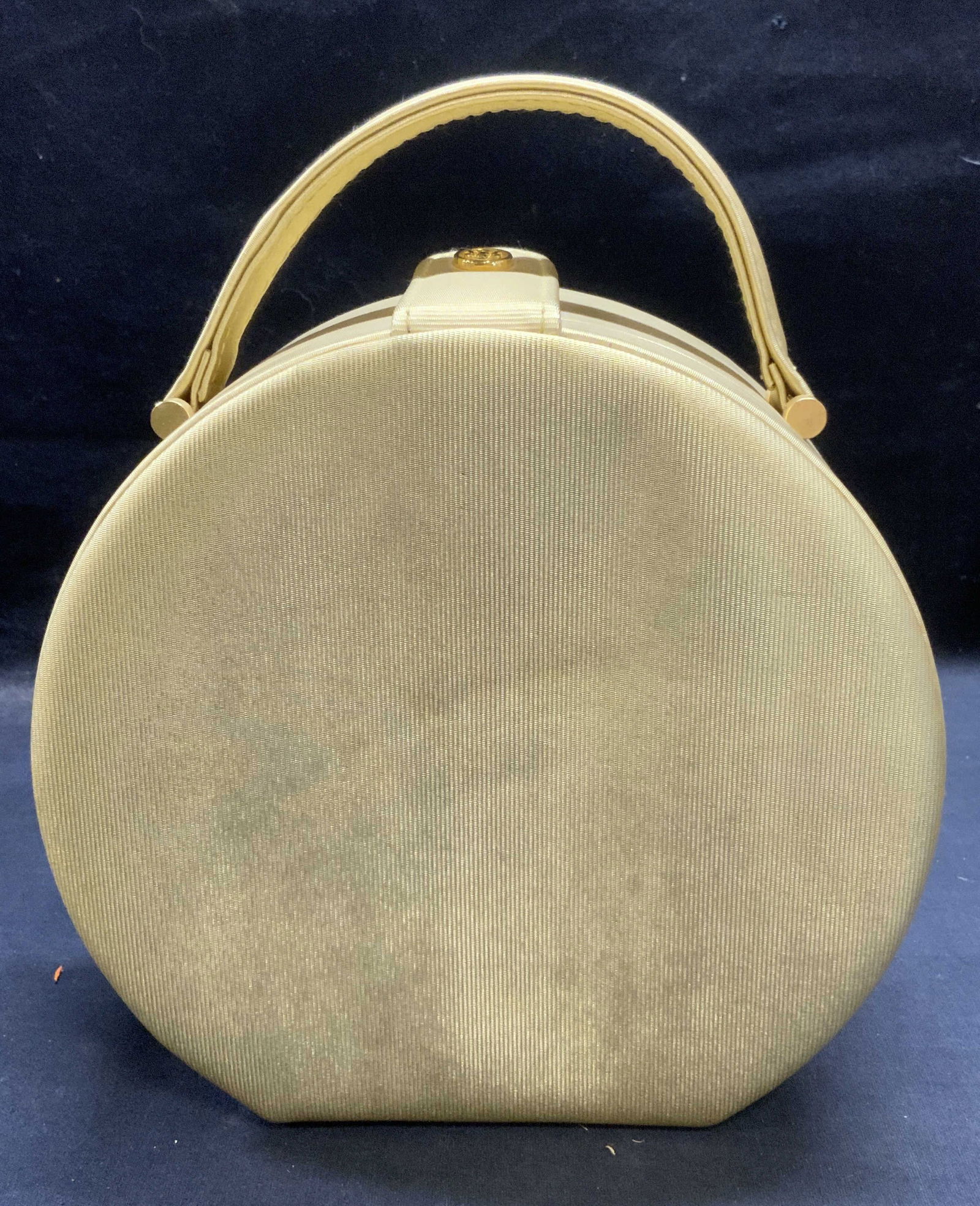 Gold Tone Fabric Box Handbag: Gold tone fabric covered box handbag. Material feels synthetic. Measures approx. 8 x 3.5 x 7.5 inches. Some wear to material and blemishes observed. Ladies handbag, ladies box handbag, ladies box bag,