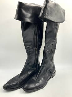 Sergio Rossi Leather Calf High Boots, Italy: Pair of black leather style calf high boots. Marked 35.5 in size and marked Sergio Rossi on underside. Folded over top half of boot with side zippers. Approx 16 inches tall and sole measuring 10 inche