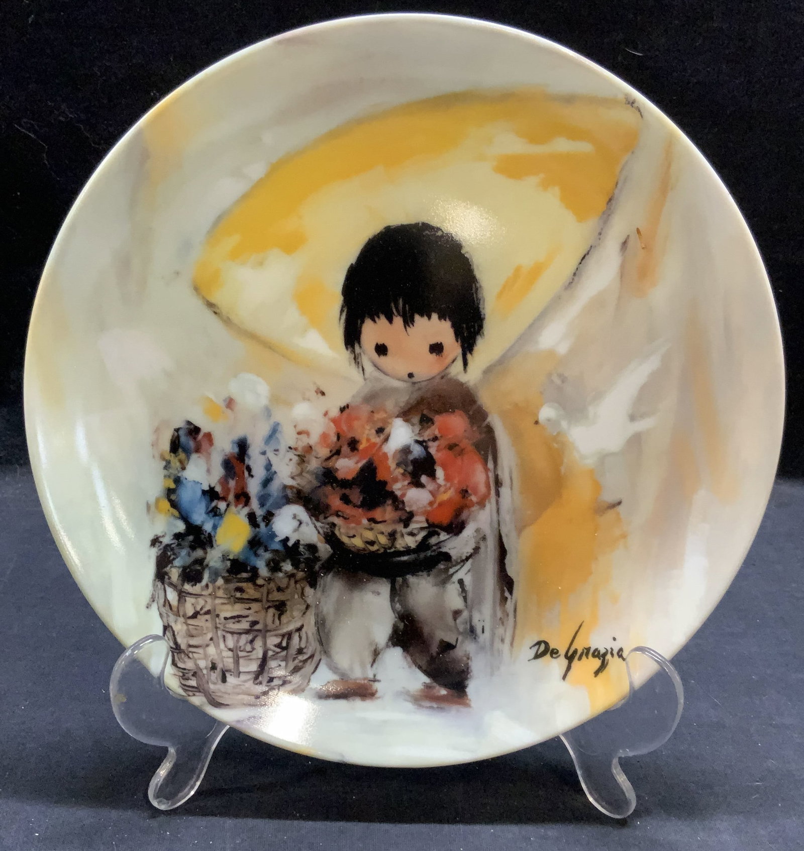 Knowles China De Grazia Children Sun Plate 1988: Knowles China Children of the Sun series plate. the Gently White Dove by Ettore de Grazia. Issued 1988. Measures approx. 8.5 inches diameter. Trademarked and numbered to underside. Includes box and ce