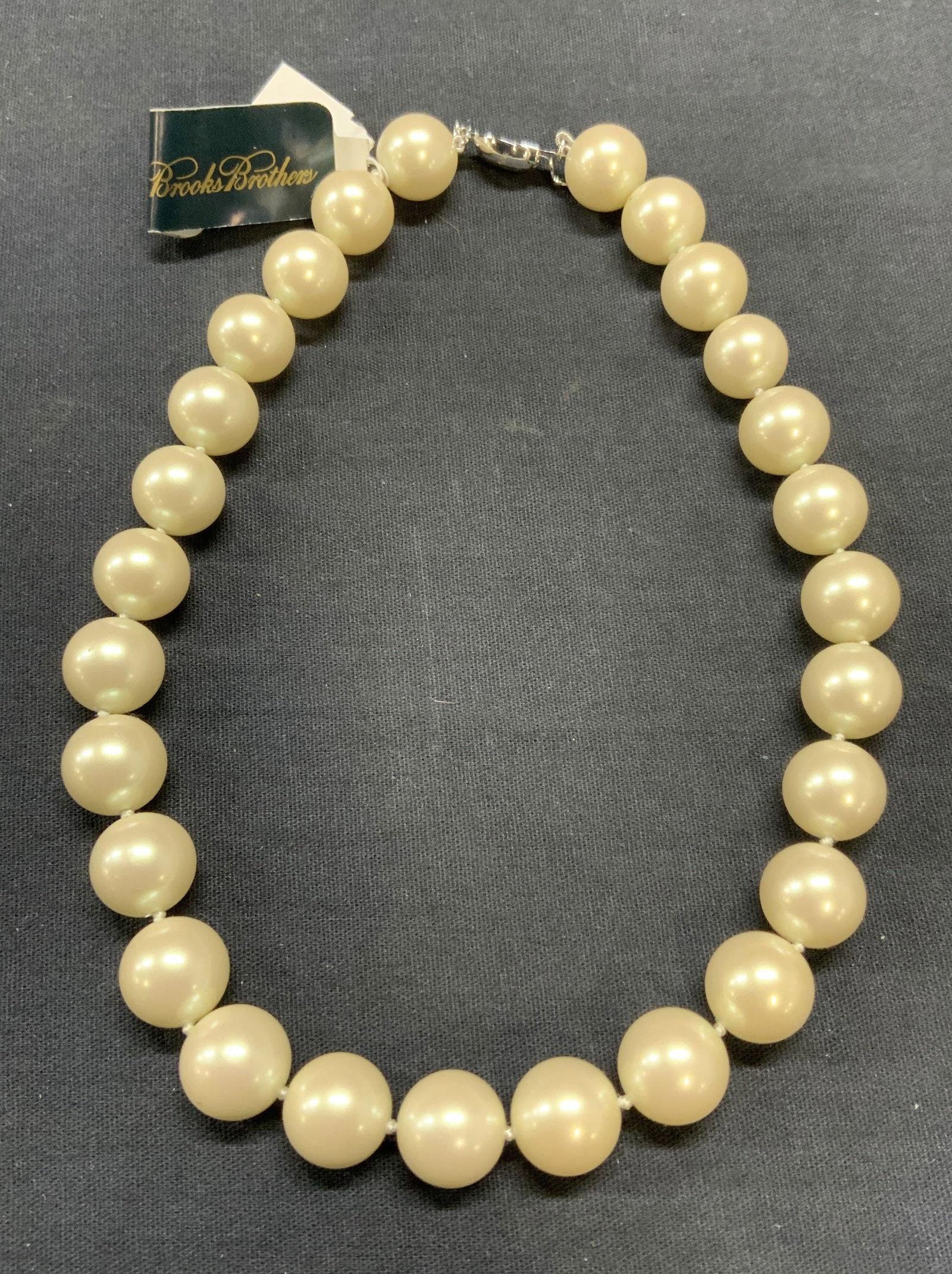 Brooks Brothers Faux Pearl Choker Necklace NWT: Brooks Brothers faux pearl beaded choker necklace. New with tag. Signed on hang tag. Drop length approx. 7.5 inches. Some surface wear consistent with exposure. Including jewelry pouch. Estate jewelry