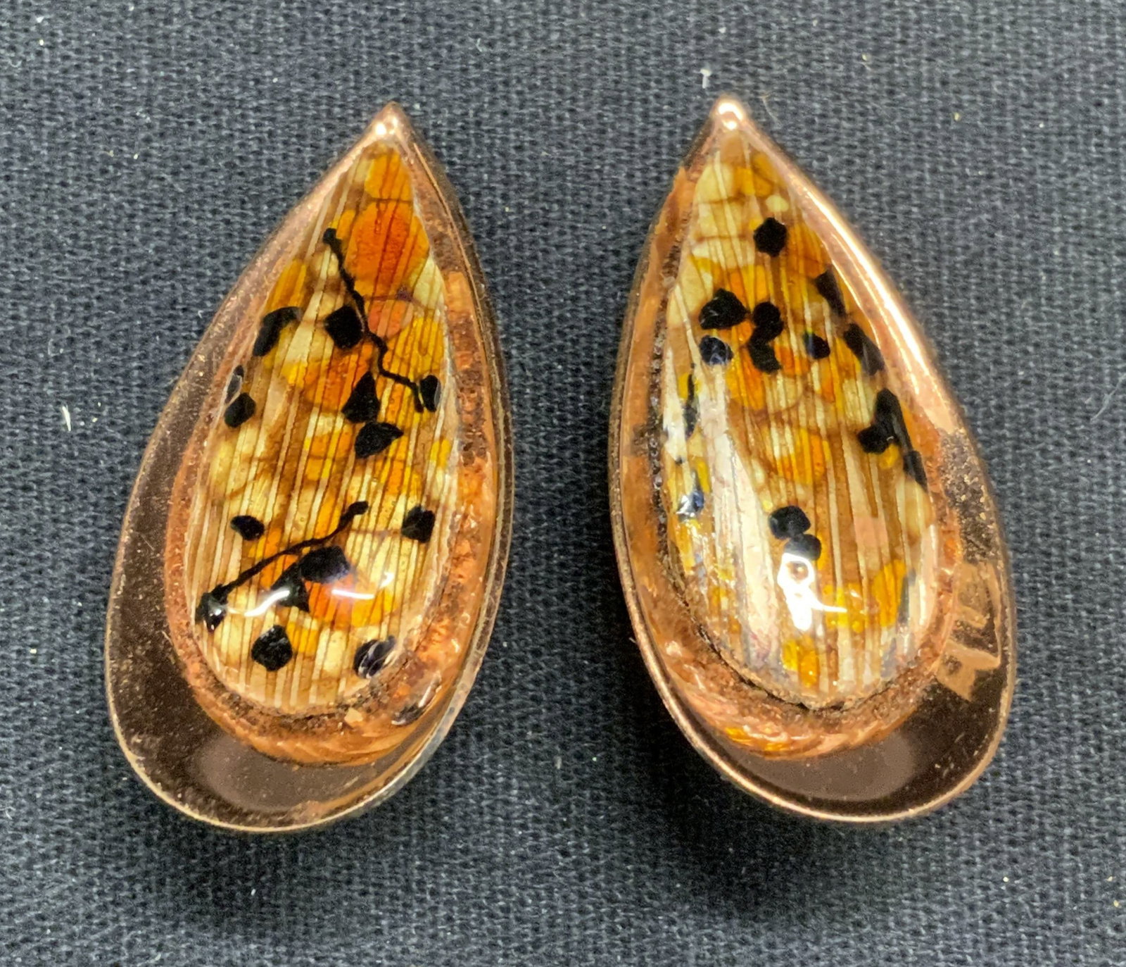 Vintage Matisse Renoir Enameled Copper Earrings: Vintage Matisse Renoir enameled copper drop earrings. Clip on backing. Signed to underside. Measure approx. 1.5 x 5/8 inches. Some scratching observed. Estate jewelry, costume jewelry, cocktail jewelr