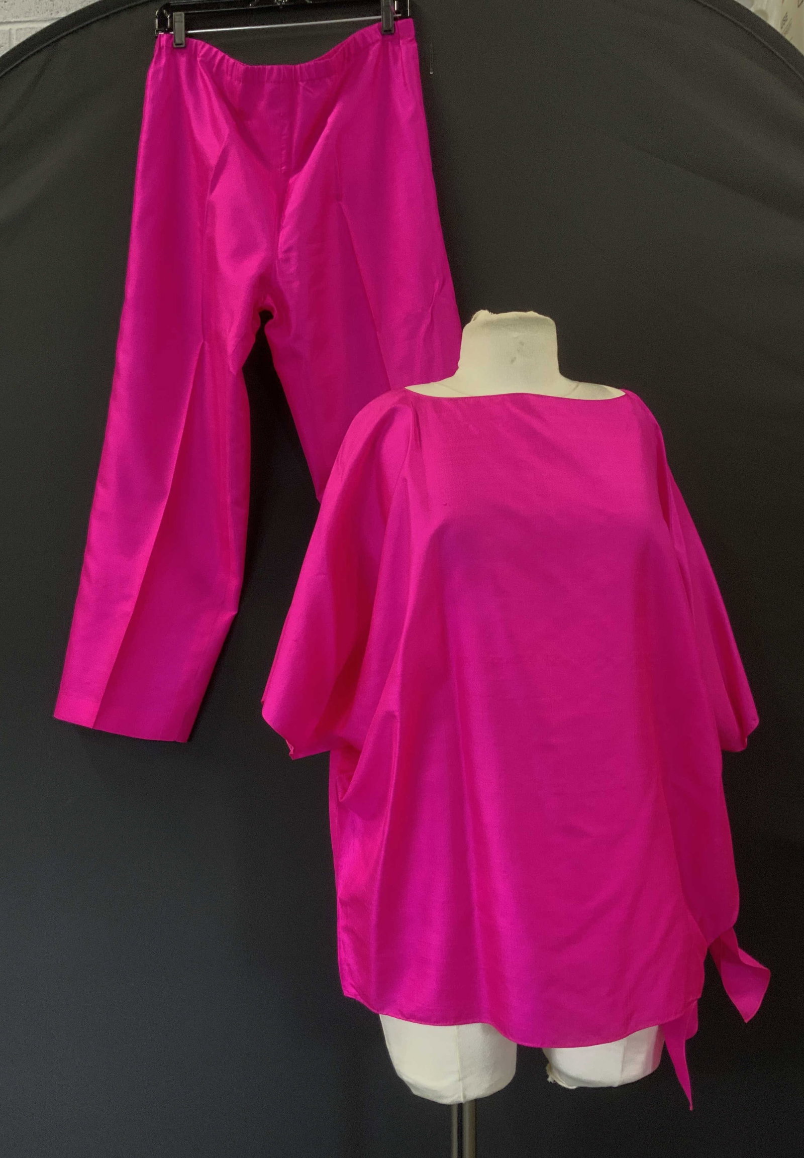 CHOISY Thai Silk Blouse & Pants Cocktail wear: Bright fuchsia ensemble, short sleeve blouse with pants. Made in Thailand of Thai Silk. Designer CHOISY. Size 12. Blouse has a side tie on lower hem . Pants 38 in. Long, inseam 25.5 in. Blouse has a c